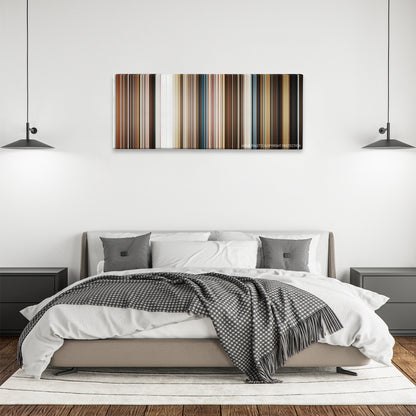 Downsizing color palette canvas above a bed, between two black pendant lamps