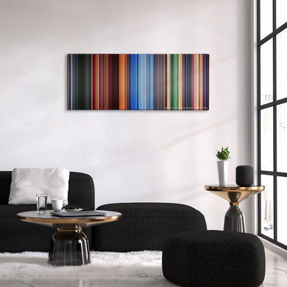 Hero color palette canvas above a black sofa with a gold-topped table