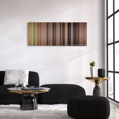 A Knight's Tale color palette canvas above a black sofa with a gold-topped table