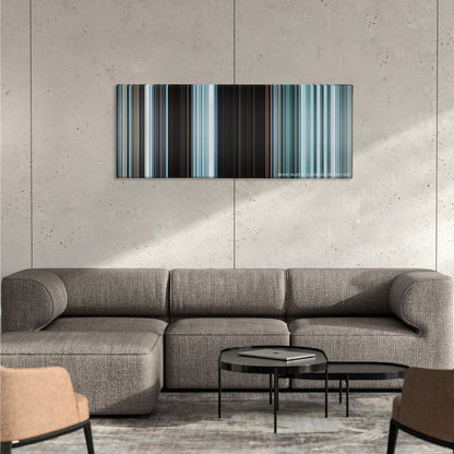The Grey color palette canvas on a concrete wall above a gray sectional sofa