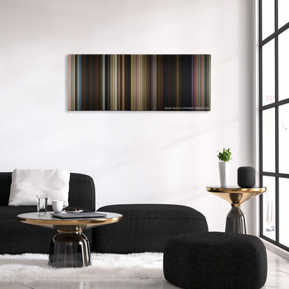 Alpha Dog color palette canvas above a black sofa with a gold-topped table