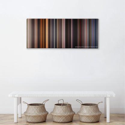 Born on the Fourth of July color palette canvas above a white bench with three woven baskets