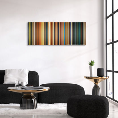Paddington color palette canvas above a black sofa with a gold-topped table