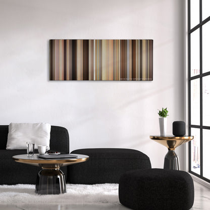 Trainwreck color palette canvas above a black sofa with a gold-topped table