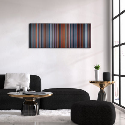 Passengers color palette canvas above a black sofa with a gold-topped table