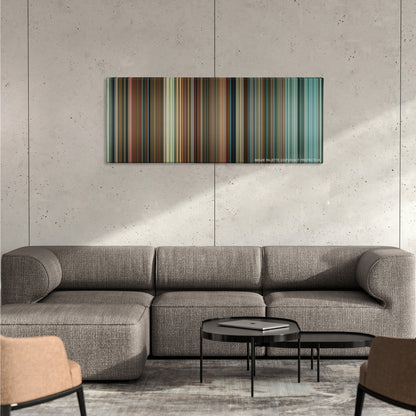 The Reader color palette canvas on a concrete wall above a gray sectional sofa