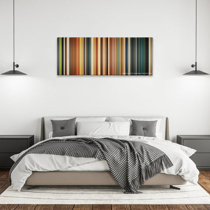 Paddington color palette canvas above a bed, between two black pendant lamps