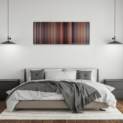 Hook color palette canvas above a bed, between two black pendant lamps