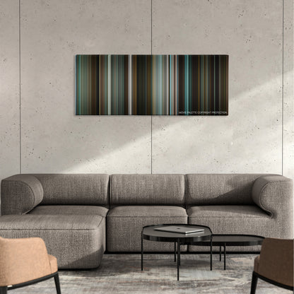 The Rum Diary color palette canvas on a concrete wall above a gray sectional sofa