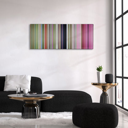 Horton Hears a Who! color palette canvas above a black sofa with a gold-topped table
