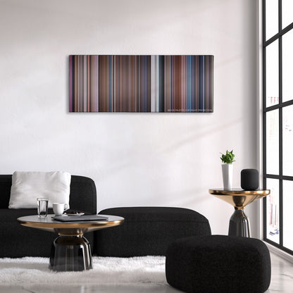 Death Becomes Her color palette canvas above a black sofa with a gold-topped table