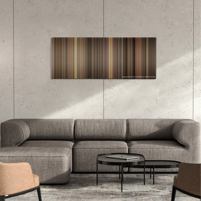 Fences color palette canvas on a concrete wall above a gray sectional sofa