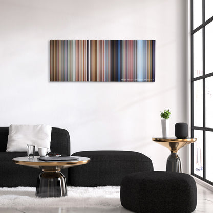 Bean color palette canvas above a black sofa with a gold-topped table