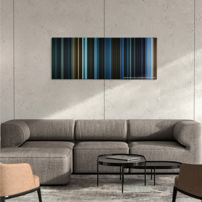 War for the Planet of the Apes color palette canvas on a concrete wall above a gray sectional sofa