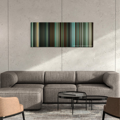 Unleashed color palette canvas on a concrete wall above a gray sectional sofa