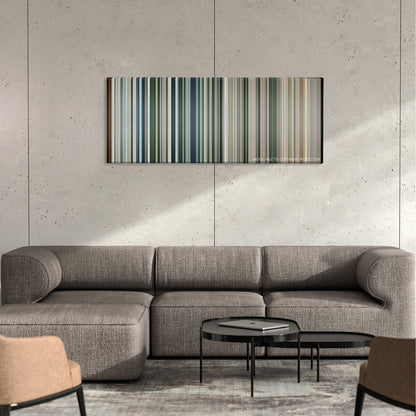 United 93 color palette canvas on a concrete wall above a gray sectional sofa