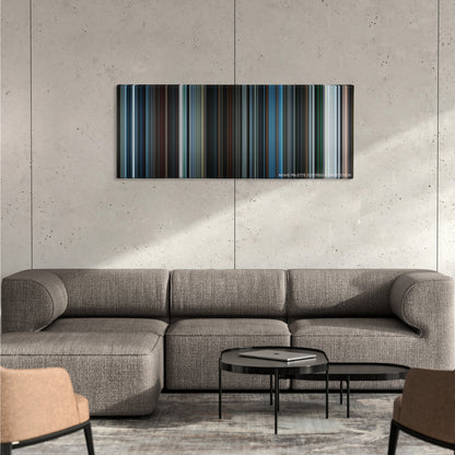 Star Trek Beyond color palette canvas on a concrete wall above a gray sectional sofa