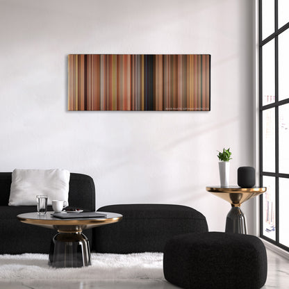 This Is 40 color palette canvas above a black sofa with a gold-topped table