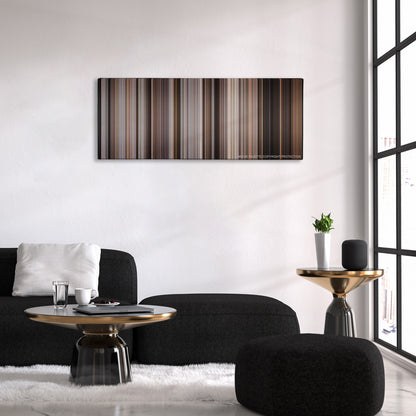 A Bronx Tale color palette canvas above a black sofa with a gold-topped table