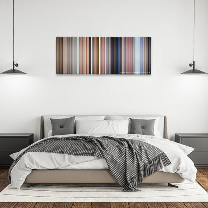 Bean color palette canvas above a bed, between two black pendant lamps