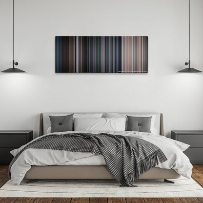 The Avengers color palette canvas above a bed, between two black pendant lamps