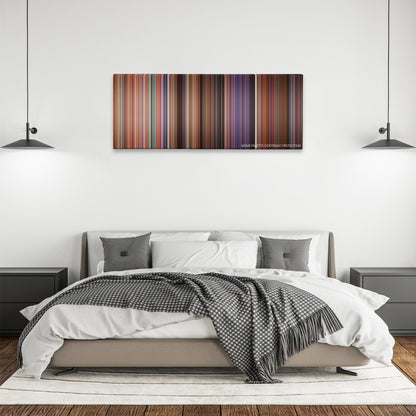 Not Another Teen Movie color palette canvas above a bed, between two black pendant lamps