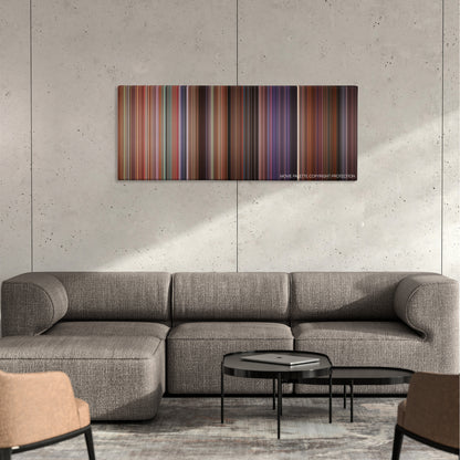 Not Another Teen Movie color palette canvas on a concrete wall above a gray sectional sofa