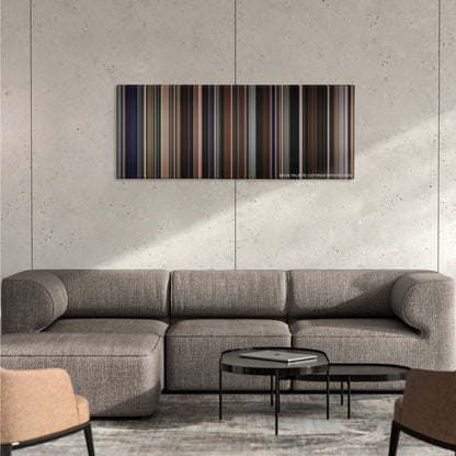 Don Jon color palette canvas on a concrete wall above a gray sectional sofa