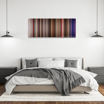Music and Lyrics color palette canvas above a bed, between two black pendant lamps