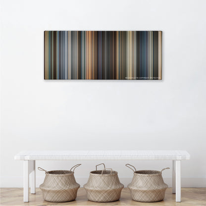 Now You See Me color palette canvas above a white bench with three woven baskets