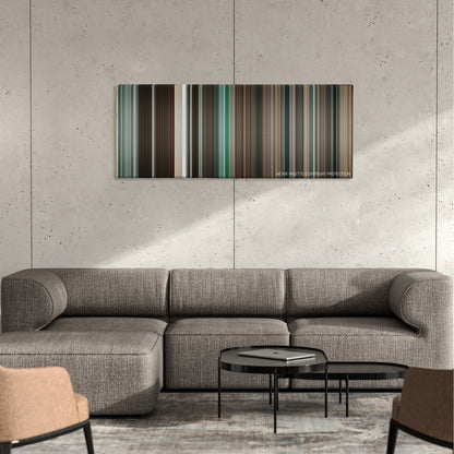 The Switch color palette canvas on a concrete wall above a gray sectional sofa