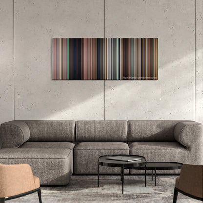 The Final Destination color palette canvas on a concrete wall above a gray sectional sofa