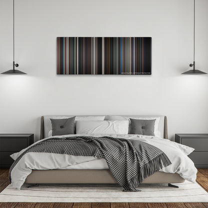 The Dark Knight color palette canvas above a bed, between two black pendant lamps