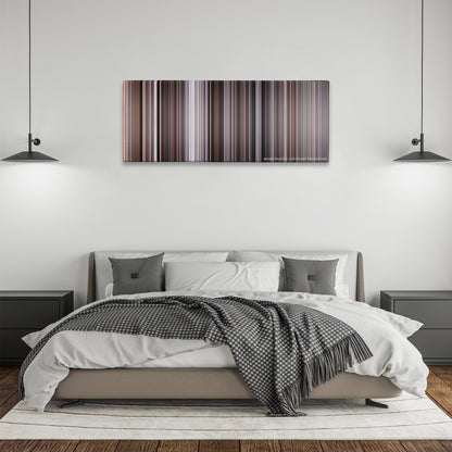 The Good, the Bad and the Ugly color palette canvas above a bed, between two black pendant lamps