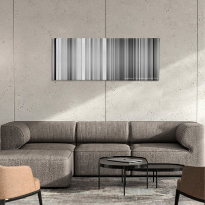 Wild Strawberries color palette canvas on a concrete wall above a gray sectional sofa