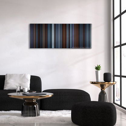 Reign of Fire color palette canvas above a black sofa with a gold-topped table