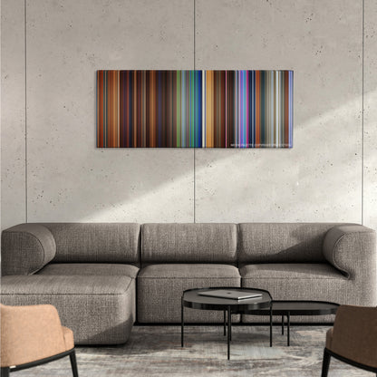 Hotel Transylvania color palette canvas on a concrete wall above a gray sectional sofa