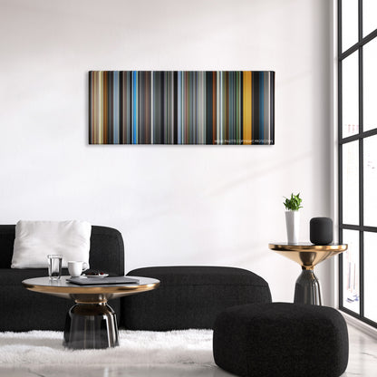 The Motorcycle Diaries color palette canvas above a black sofa with a gold-topped table