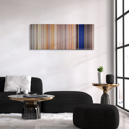 Clerks II color palette canvas above a black sofa with a gold-topped table