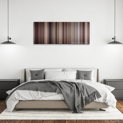 The Man with the Golden Gun color palette canvas above a bed, between two black pendant lamps