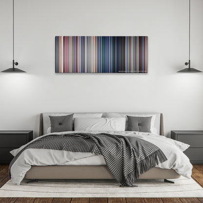 Jurassic Park color palette canvas above a bed, between two black pendant lamps