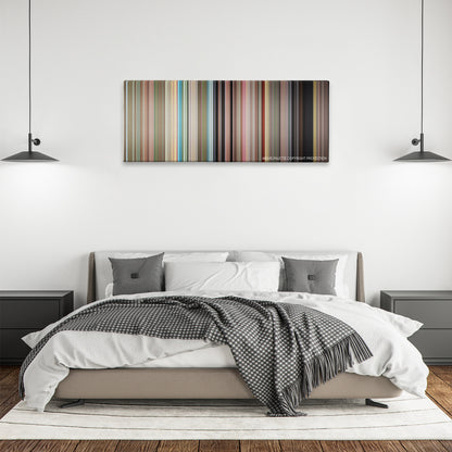 Super Troopers color palette canvas above a bed, between two black pendant lamps
