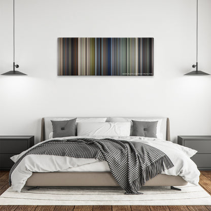 U.S. Marshals color palette canvas above a bed, between two black pendant lamps