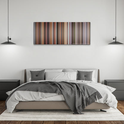Old School color palette canvas above a bed, between two black pendant lamps