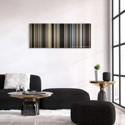 St. Vincent color palette canvas above a black sofa with a gold-topped table