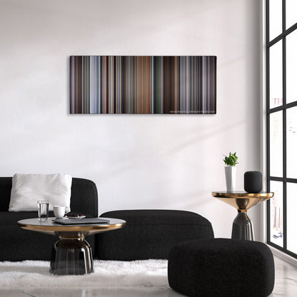 The Italian Job color palette canvas above a black sofa with a gold-topped table