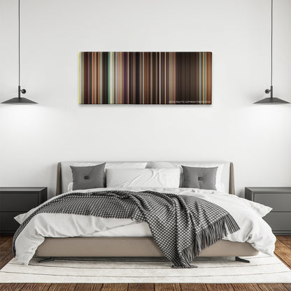 Ruby Sparks color palette canvas above a bed, between two black pendant lamps
