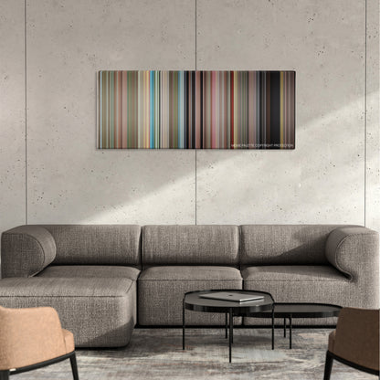 Super Troopers color palette canvas on a concrete wall above a gray sectional sofa