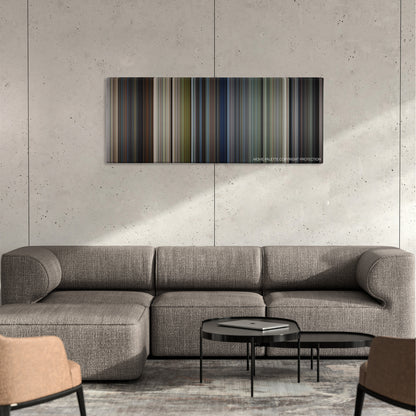 U.S. Marshals color palette canvas on a concrete wall above a gray sectional sofa