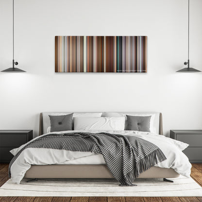 Long Shot color palette canvas above a bed, between two black pendant lamps